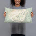 Person holding 20x12 Custom Mauna Kea Hawaii Map Throw Pillow in Woodblock