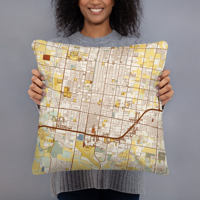 Person holding 18x18 Custom McAllen Texas Map Throw Pillow in Woodblock