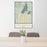 24x36 McCall Idaho Map Print Portrait Orientation in Woodblock Style Behind 2 Chairs Table and Potted Plant