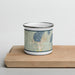 Front View Custom McCall Idaho Map Enamel Mug in Woodblock on Cutting Board