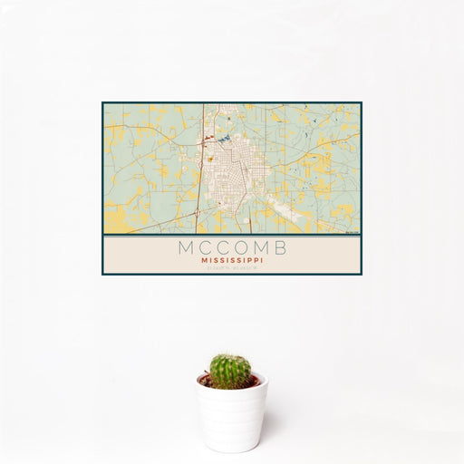 12x18 McComb Mississippi Map Print Landscape Orientation in Woodblock Style With Small Cactus Plant in White Planter