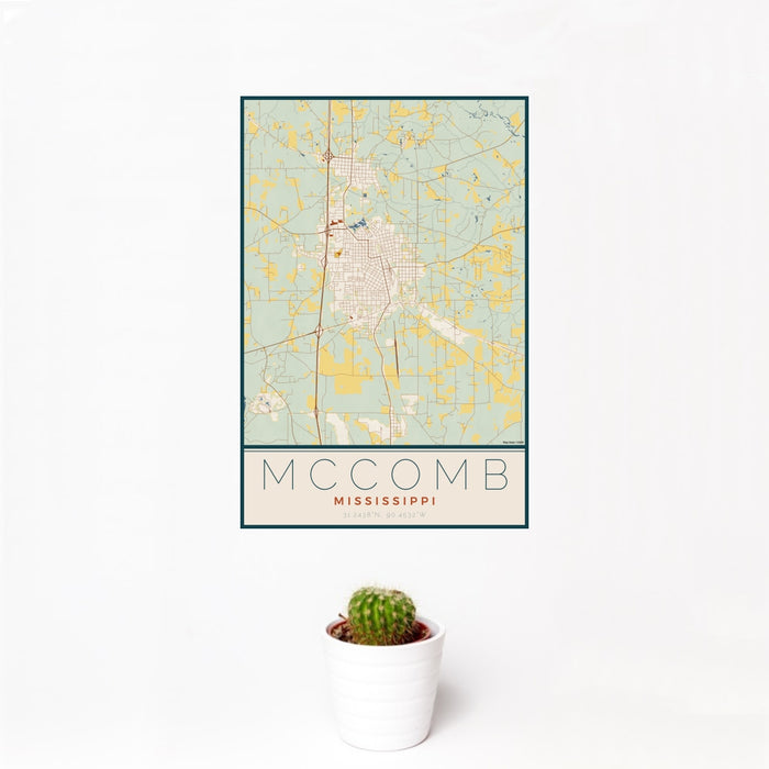 12x18 McComb Mississippi Map Print Portrait Orientation in Woodblock Style With Small Cactus Plant in White Planter