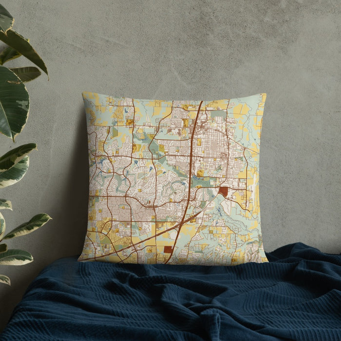 Custom McKinney Texas Map Throw Pillow in Woodblock on Bedding Against Wall