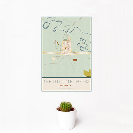 12x18 Medicine Bow Wyoming Map Print Portrait Orientation in Woodblock Style With Small Cactus Plant in White Planter