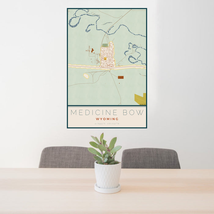 24x36 Medicine Bow Wyoming Map Print Portrait Orientation in Woodblock Style Behind 2 Chairs Table and Potted Plant