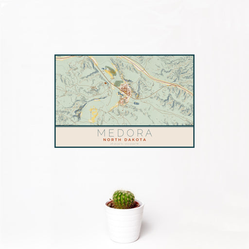 12x18 Medora North Dakota Map Print Landscape Orientation in Woodblock Style With Small Cactus Plant in White Planter