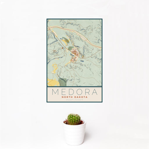 12x18 Medora North Dakota Map Print Portrait Orientation in Woodblock Style With Small Cactus Plant in White Planter