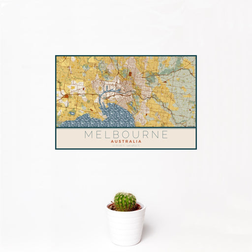 12x18 Melbourne Australia Map Print Landscape Orientation in Woodblock Style With Small Cactus Plant in White Planter