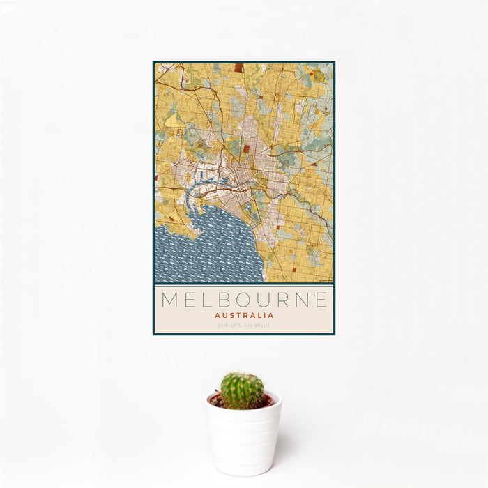 12x18 Melbourne Australia Map Print Portrait Orientation in Woodblock Style With Small Cactus Plant in White Planter