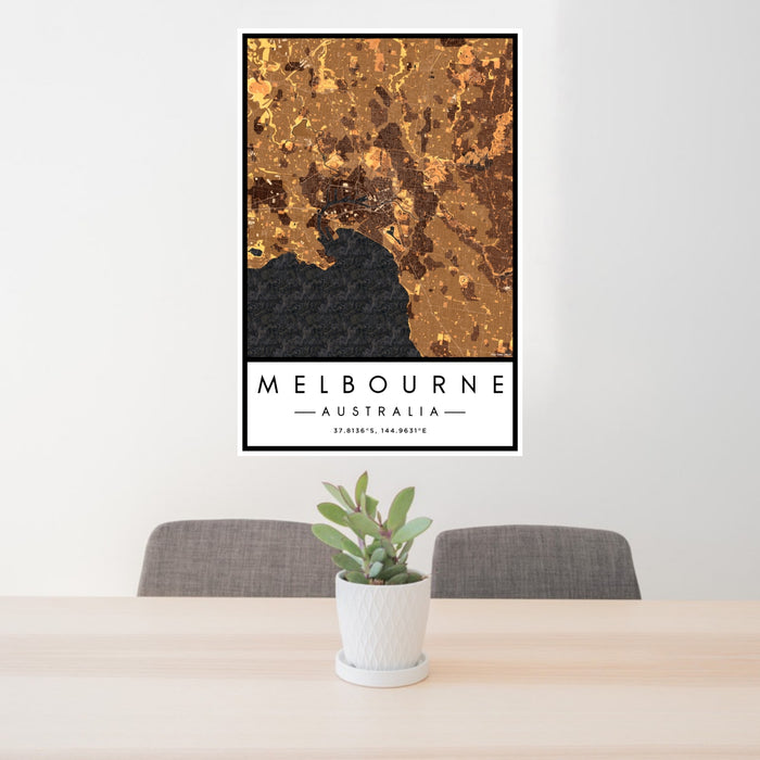 24x36 Melbourne Australia Map Print Portrait Orientation in Ember Style Behind 2 Chairs Table and Potted Plant