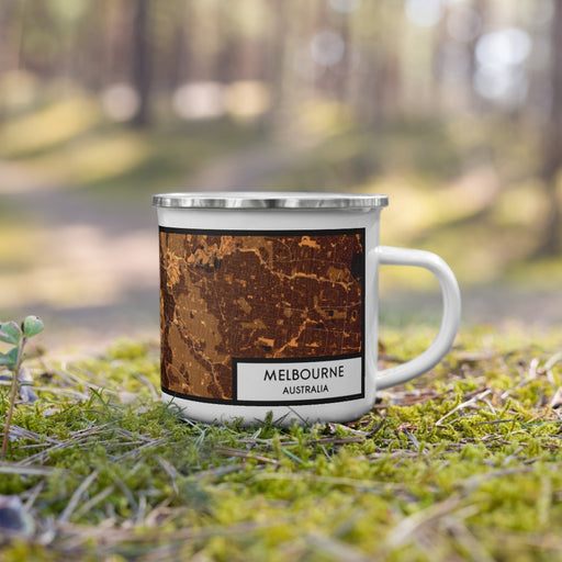 Right View Custom Melbourne Australia Map Enamel Mug in Ember on Grass With Trees in Background