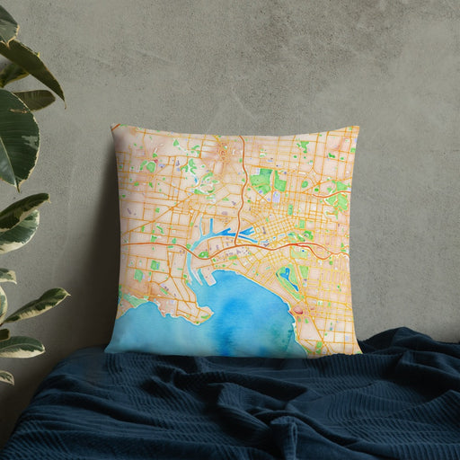 Custom Melbourne Australia Map Throw Pillow in Watercolor on Bedding Against Wall