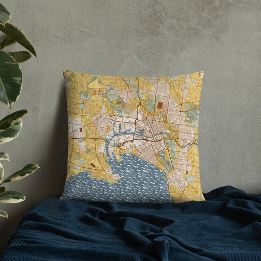 Custom Melbourne Australia Map Throw Pillow in Woodblock on Bedding Against Wall