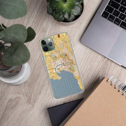 Custom Melbourne Australia Map Phone Case in Woodblock on Table with Laptop and Plant