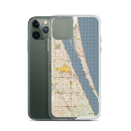 Custom Melbourne Florida Map Phone Case in Woodblock on Table with Laptop and Plant