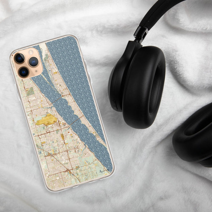 Custom Melbourne Florida Map Phone Case in Woodblock on Table with Black Headphones