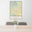 24x36 Mena Arkansas Map Print Portrait Orientation in Woodblock Style Behind 2 Chairs Table and Potted Plant