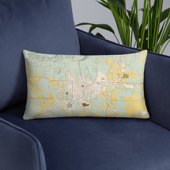 Custom Mena Arkansas Map Throw Pillow in Woodblock on Blue Colored Chair