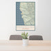 24x36 Mendocino California Map Print Portrait Orientation in Woodblock Style Behind 2 Chairs Table and Potted Plant