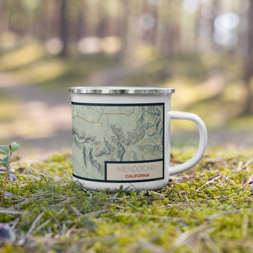 Right View Custom Mendocino California Map Enamel Mug in Woodblock on Grass With Trees in Background