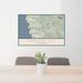 24x36 Mendocino California Map Print Landscape Orientation in Woodblock Style Behind 2 Chairs Table and Potted Plant