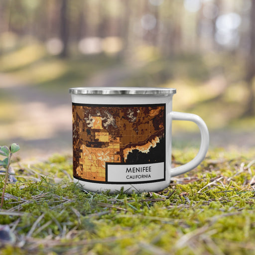 Right View Custom Menifee California Map Enamel Mug in Ember on Grass With Trees in Background