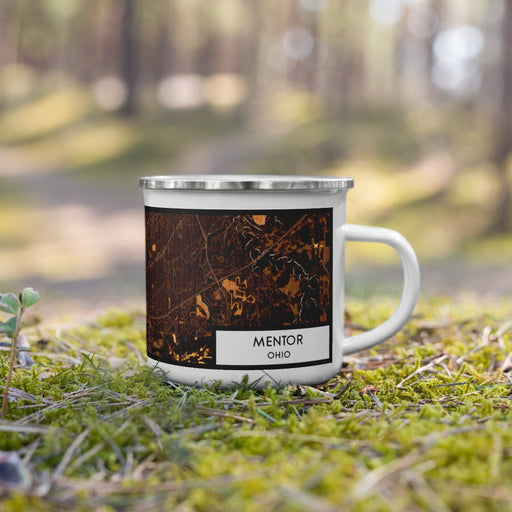 Right View Custom Mentor Ohio Map Enamel Mug in Ember on Grass With Trees in Background