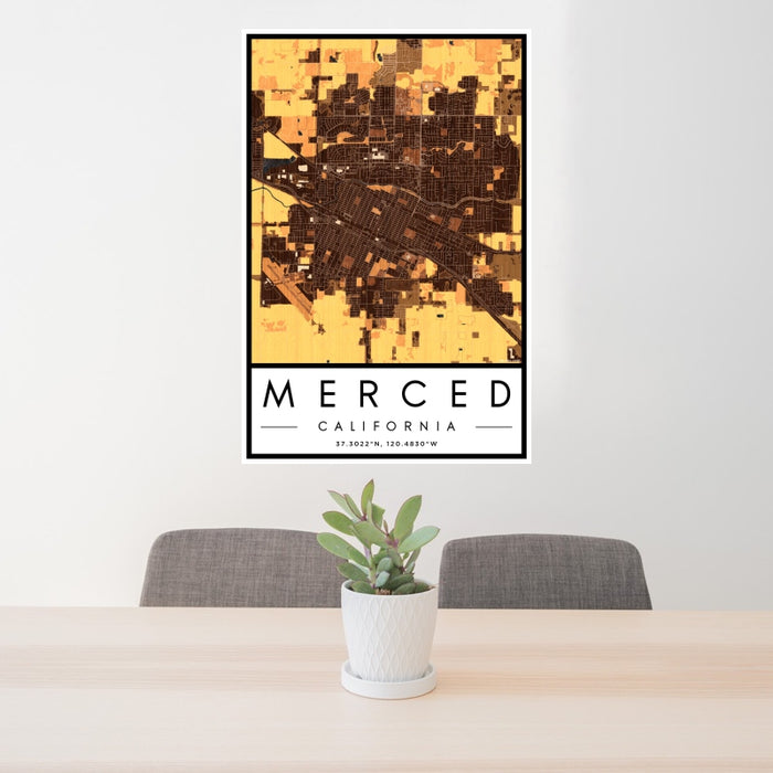 24x36 Merced California Map Print Portrait Orientation in Ember Style Behind 2 Chairs Table and Potted Plant