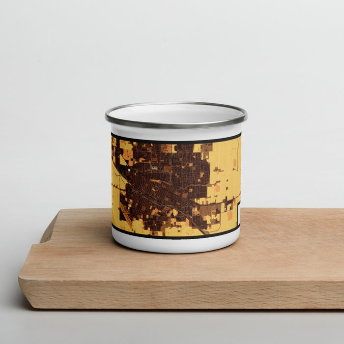 Front View Custom Merced California Map Enamel Mug in Ember on Cutting Board