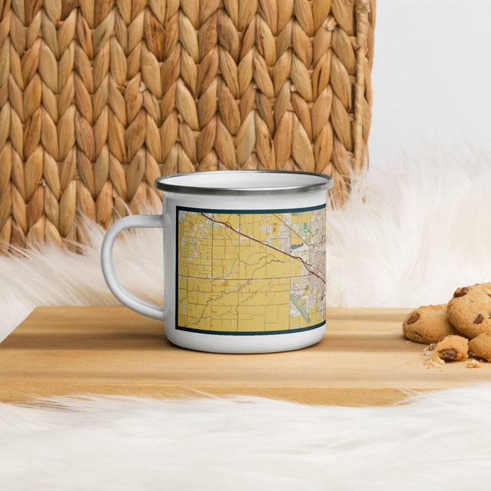 Left View Custom Merced California Map Enamel Mug in Woodblock on Table Top