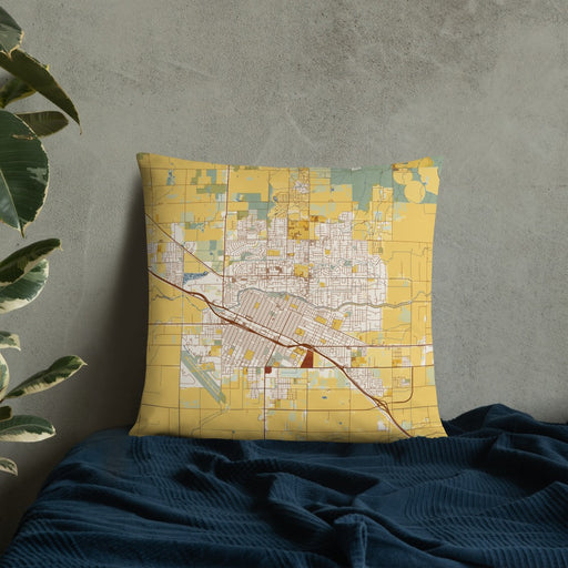 Custom Merced California Map Throw Pillow in Woodblock on Bedding Against Wall