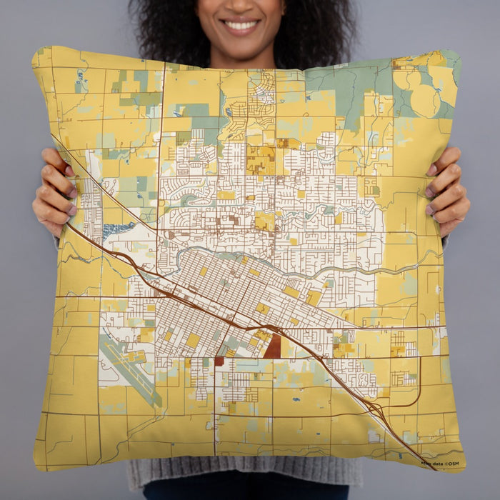 Person holding 22x22 Custom Merced California Map Throw Pillow in Woodblock
