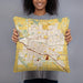 Person holding 18x18 Custom Merced California Map Throw Pillow in Woodblock