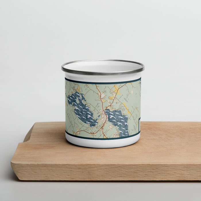 Front View Custom Meredith New Hampshire Map Enamel Mug in Woodblock on Cutting Board