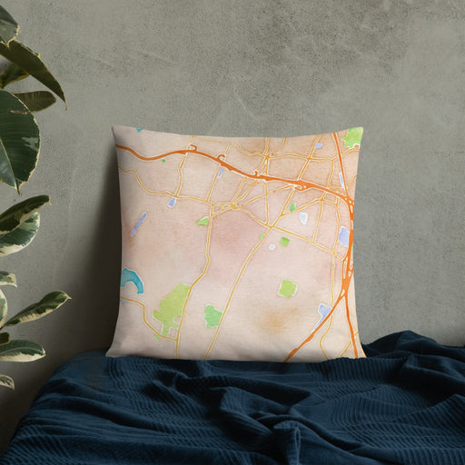 Custom Meriden Connecticut Map Throw Pillow in Watercolor on Bedding Against Wall