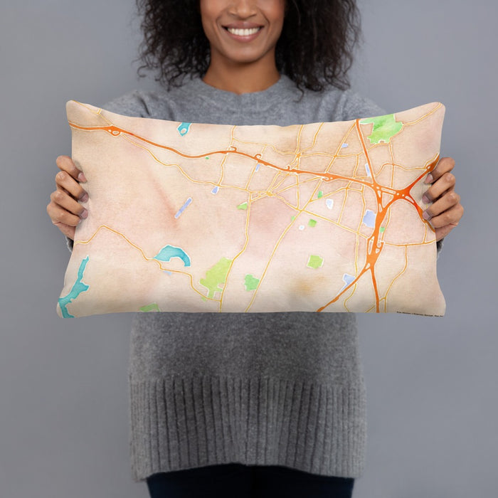 Person holding 20x12 Custom Meriden Connecticut Map Throw Pillow in Watercolor