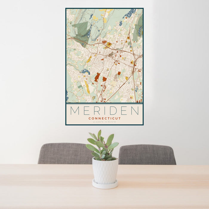 24x36 Meriden Connecticut Map Print Portrait Orientation in Woodblock Style Behind 2 Chairs Table and Potted Plant
