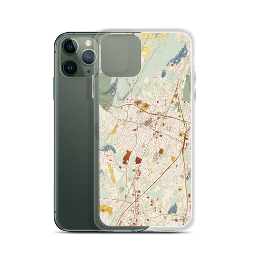 Custom Meriden Connecticut Map Phone Case in Woodblock on Table with Laptop and Plant