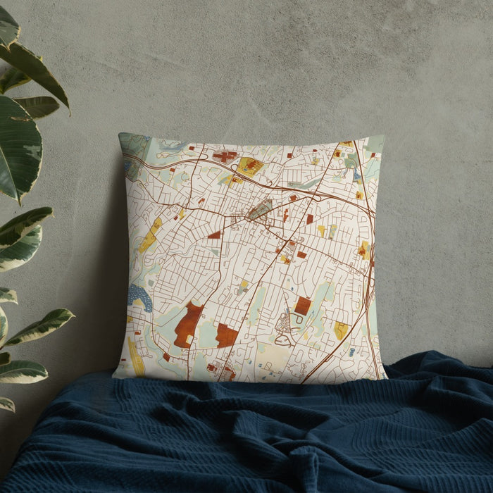 Custom Meriden Connecticut Map Throw Pillow in Woodblock on Bedding Against Wall