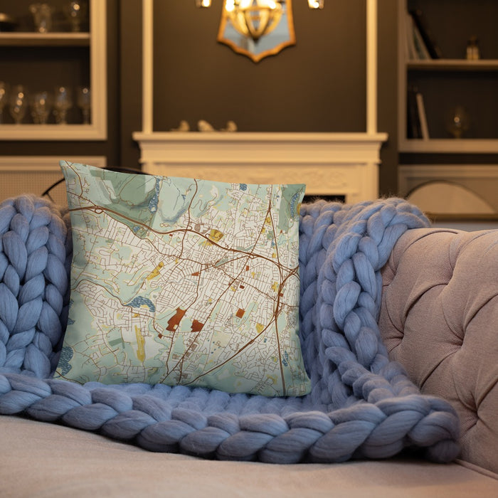 Custom Meriden Connecticut Map Throw Pillow in Woodblock on Cream Colored Couch