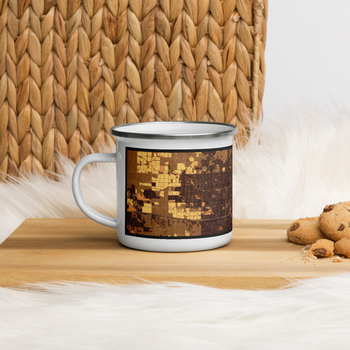 Left View Custom Meridian Idaho Map Enamel Mug in Ember on Table Top