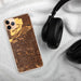 Custom Mesa Arizona Map Phone Case in Ember on Table with Black Headphones