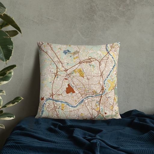 Custom Methuen Massachusetts Map Throw Pillow in Woodblock on Bedding Against Wall