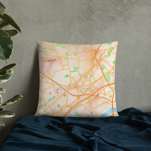 Custom Metuchen New Jersey Map Throw Pillow in Watercolor on Bedding Against Wall
