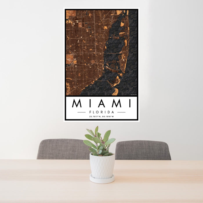 24x36 Miami Florida Map Print Portrait Orientation in Ember Style Behind 2 Chairs Table and Potted Plant