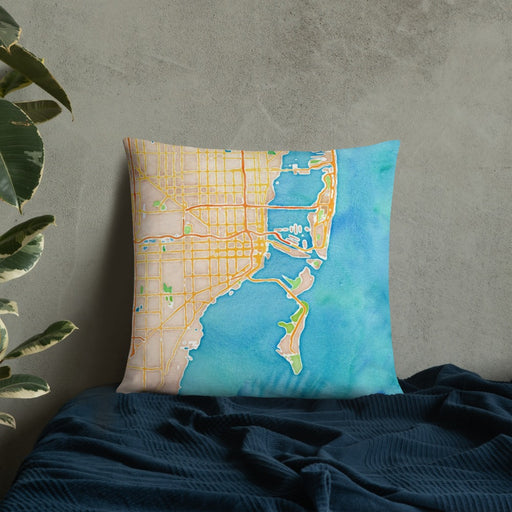 Custom Miami Florida Map Throw Pillow in Watercolor on Bedding Against Wall