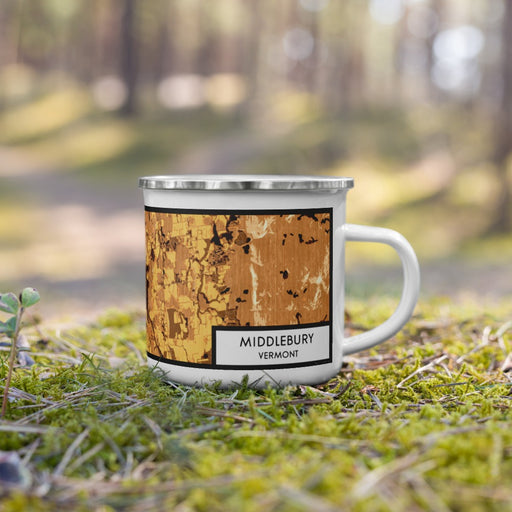 Right View Custom Middlebury Vermont Map Enamel Mug in Ember on Grass With Trees in Background