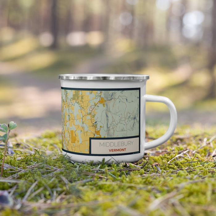 Right View Custom Middlebury Vermont Map Enamel Mug in Woodblock on Grass With Trees in Background
