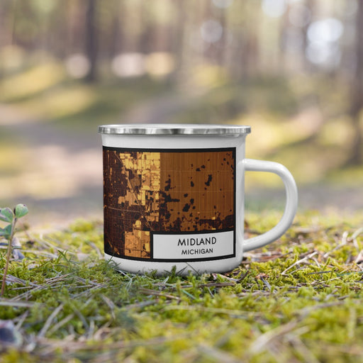 Right View Custom Midland Michigan Map Enamel Mug in Ember on Grass With Trees in Background