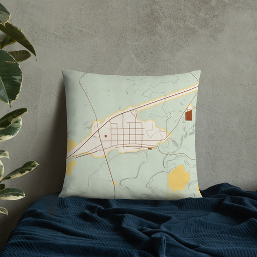 Custom Midland South Dakota Map Throw Pillow in Woodblock on Bedding Against Wall